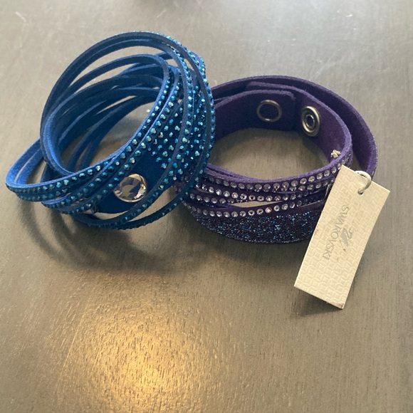 Swarovski Jewelry - 2 Swarovski Slake crystal wrap bracelets blue purple